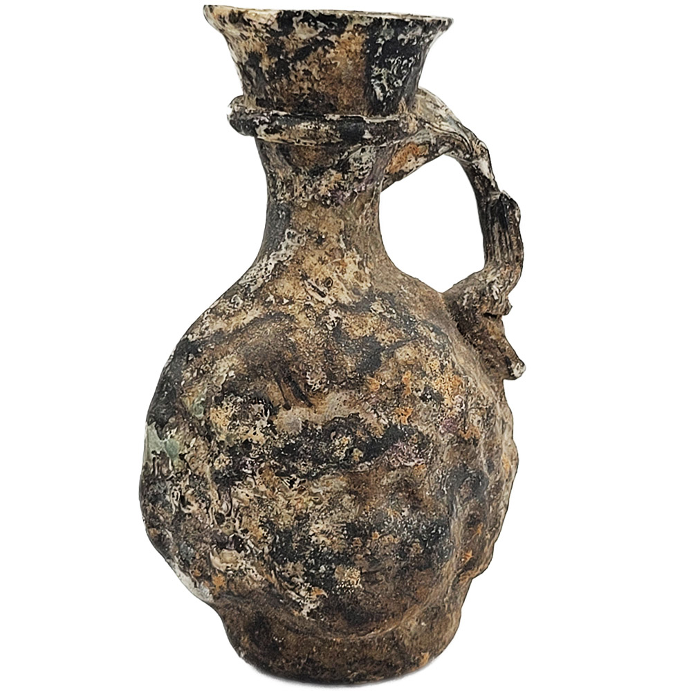 Roman Glass Perfume Jug with Head of Janus